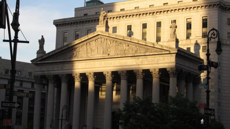 Thematic lead image: scales of justice courthouse — US Executions: A Sub-National Anomaly in a Shifting Global Trend | National Times