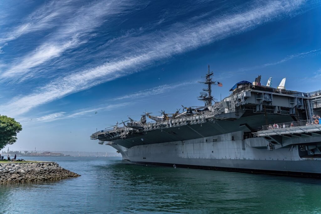 Thematic lead image: aircraft carrier at sea — USS Abraham Lincoln's Extended Deployment Exposes Strain on Naval Readiness | National Times