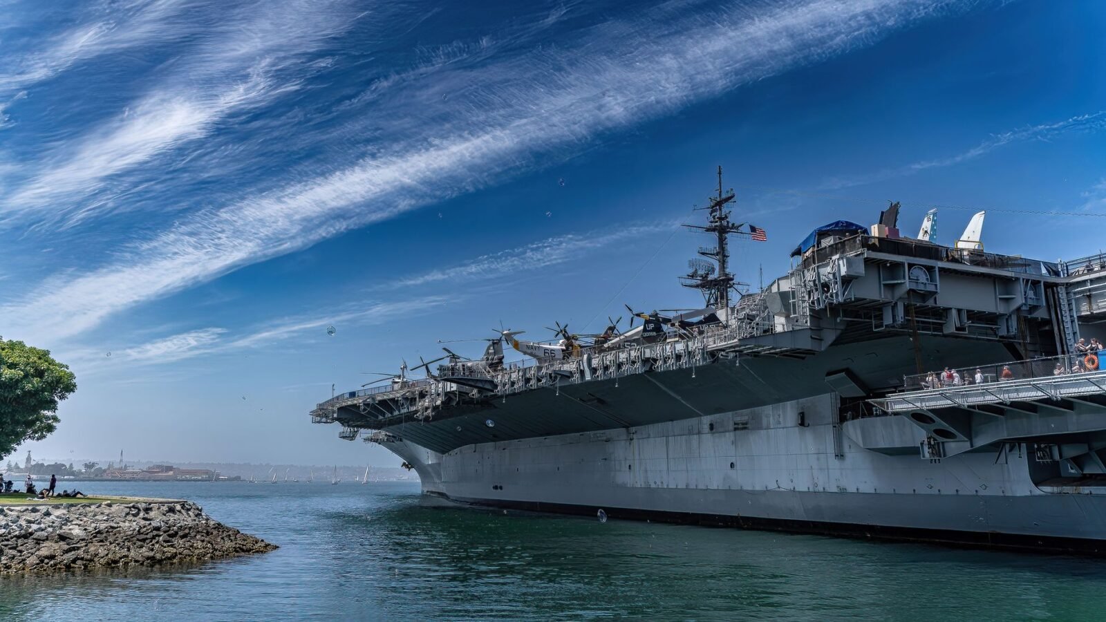 Thematic lead image: aircraft carrier at sea — USS Abraham Lincoln's Extended Deployment Exposes Strain on Naval Readiness | National Times