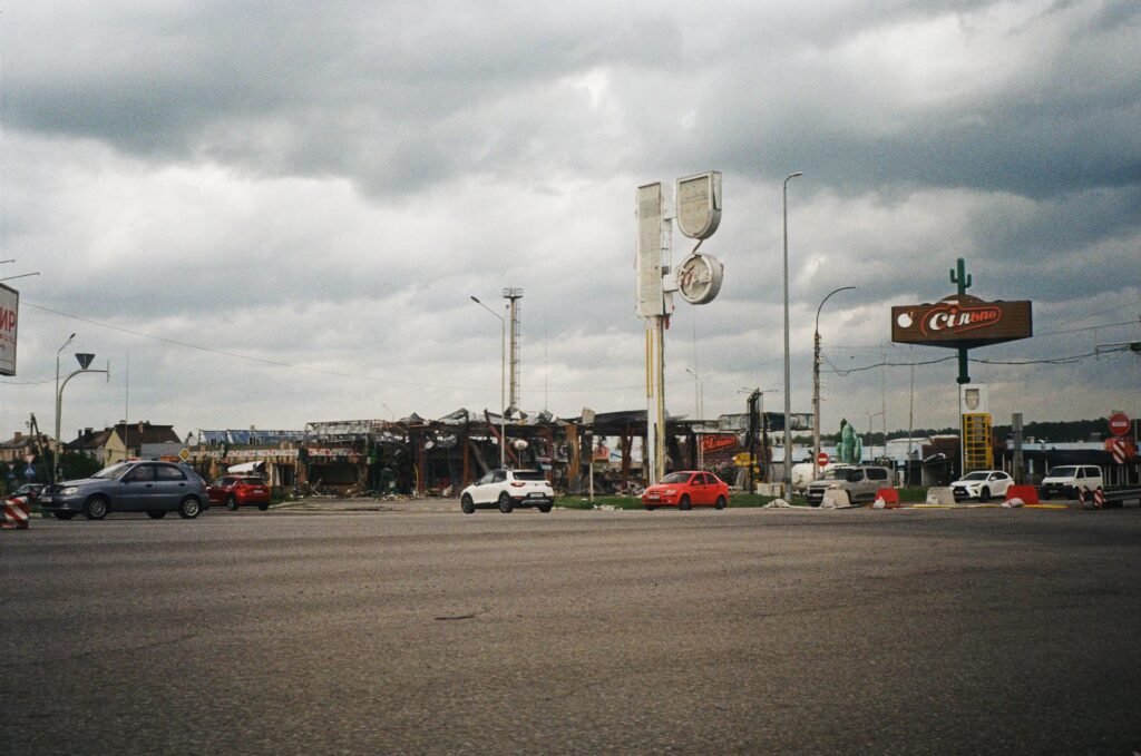 Thematic lead image: damaged infrastructure, city skyline — Kyiv Infrastructure Strikes: Escalation or Strategic Stalemate? | National Times