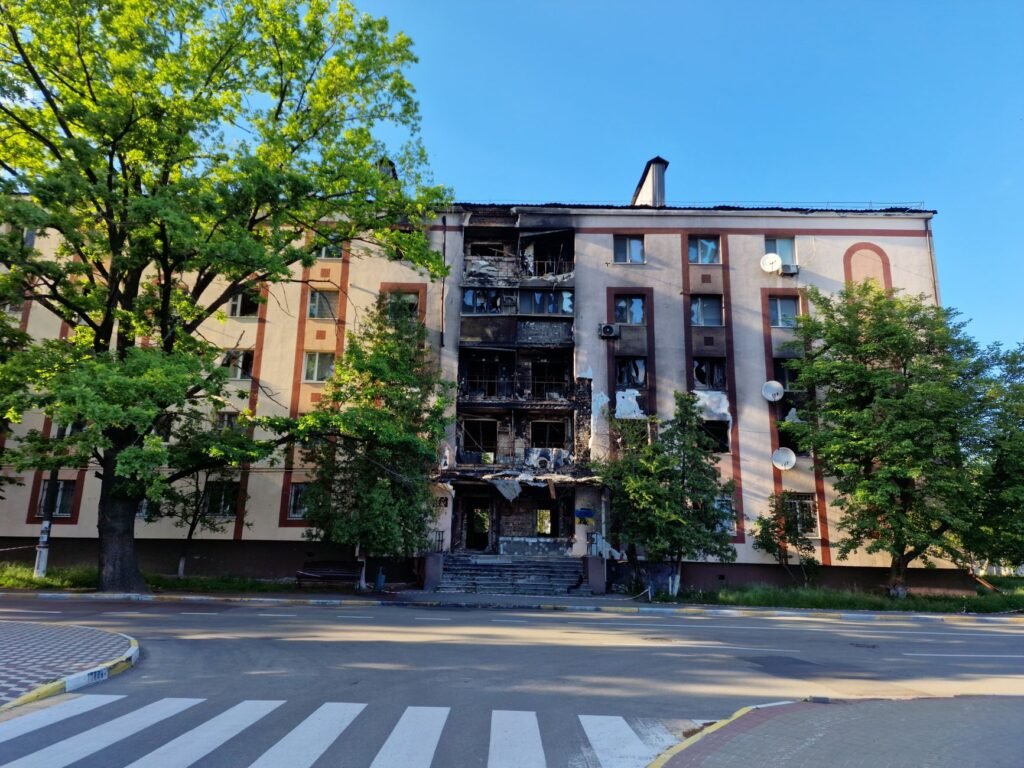 Thematic lead image: damaged city landscape — Ukraine's Escalation: Strategic Shift or Retaliatory Cycle? | National Times