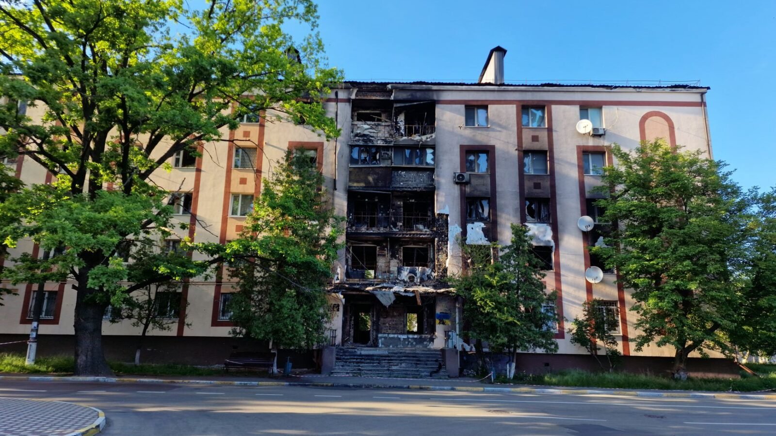 Thematic lead image: damaged city landscape — Ukraine's Escalation: Strategic Shift or Retaliatory Cycle? | National Times