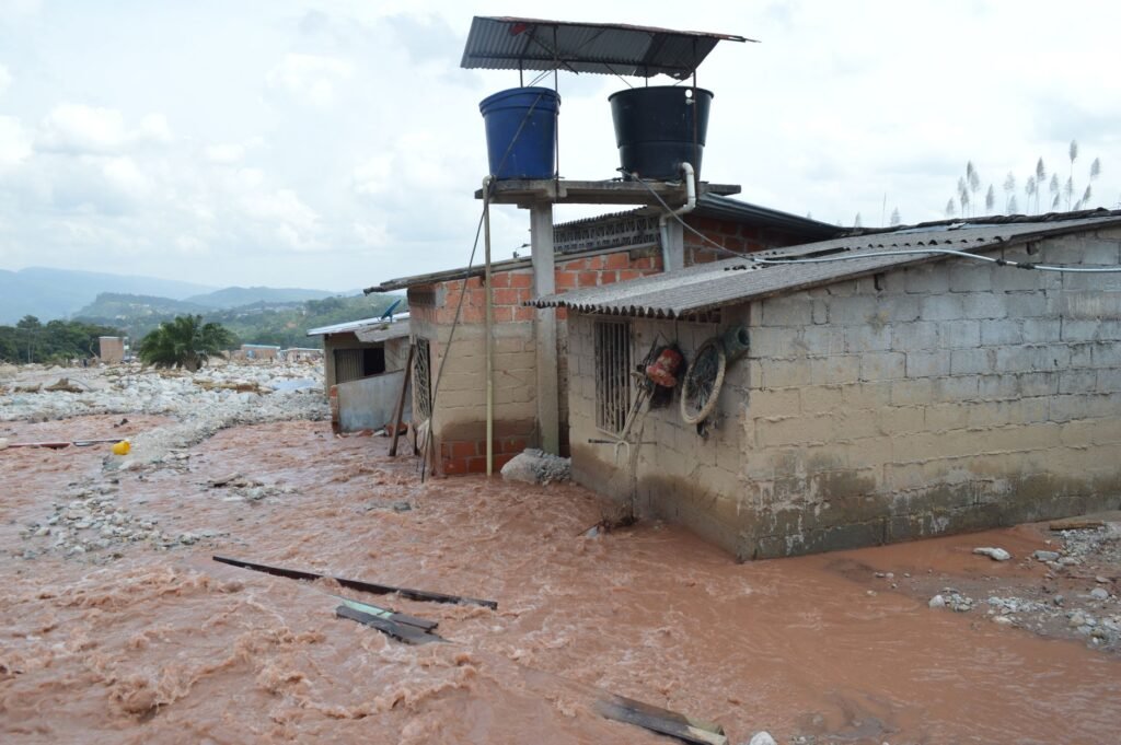 Thematic lead image: Venezuelan migrants informal settlement — Seismic Migration: Venezuela's Exodus Navigates Disaster Risk | National Times