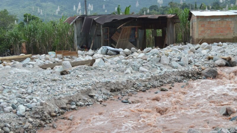 Thematic lead image: flood devastation, river, mountains — Nepal Floods Reveal State Capacity Deficits Amid Climate Strain | National Times
