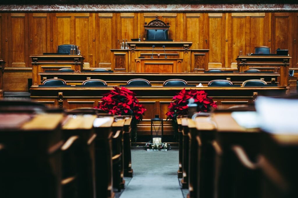 Thematic lead image: courtroom, jury box — Anonymous Jury in Mangione Trial Signifies Precedent for High-Profile Cases | National Times