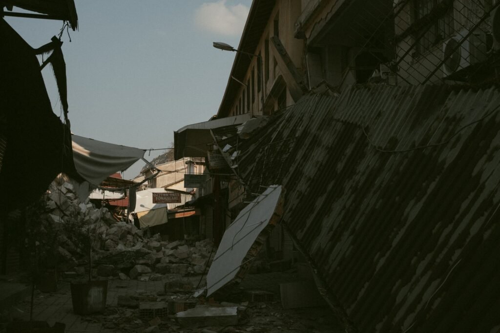 Thematic lead image: earthquake aftermath, aid distribution — Indonesia Quake Tests Disaster Response Capacity, Fiscal Resilience | National Times