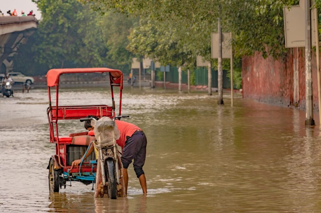Thematic lead image: flooding, traffic, monsoon — Monsoon Deluge Exposes Delhi's Infrastructure Fault Lines | National Times