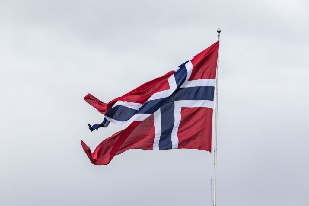 Thematic lead image: Oslo City Hall, Norwegian flag — Oslo Mayor's Wedding Cancellation Signals Royal Succession Dynamics | National Times