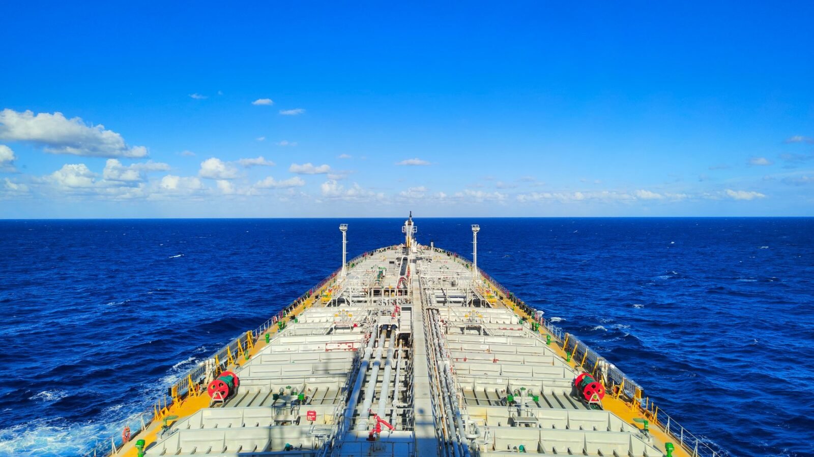 Thematic lead image: oil tanker, strait, naval vessels — Hormuz Strait: Competing Claims Signal Deeper Stalemate | National Times