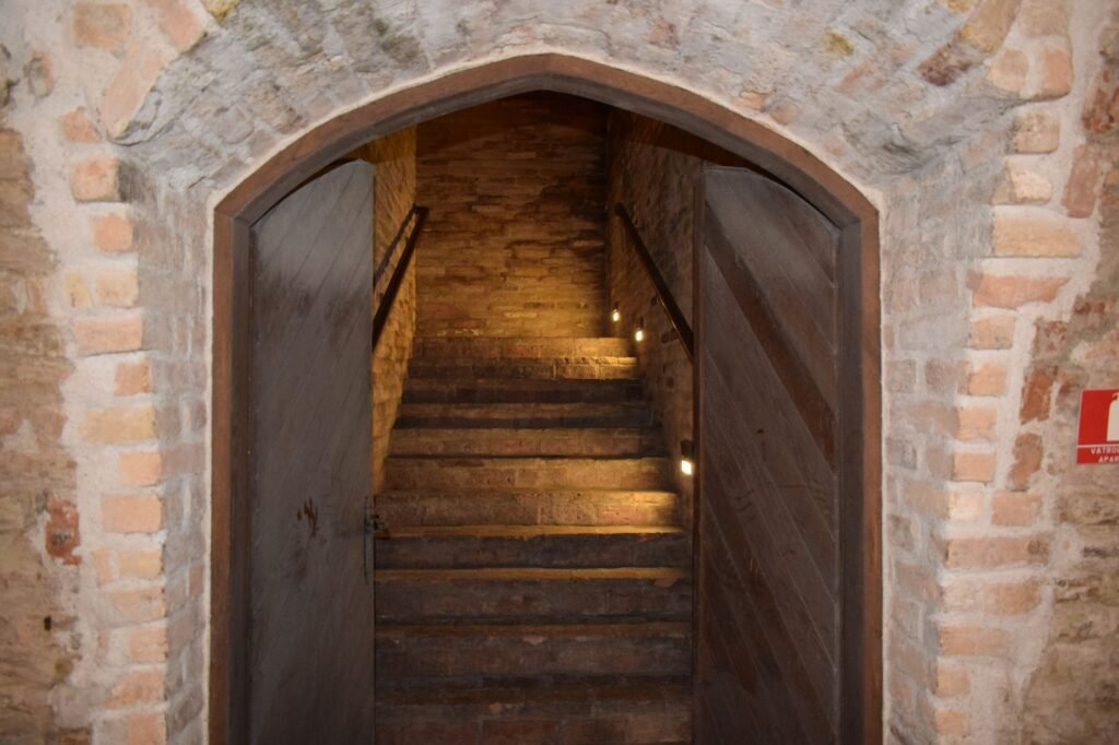 Thematic lead image: gold bars, cellar, hidden wealth — Unearthing €9m Gold: A Bellwether for Capital Flight and Secrecy | National Times