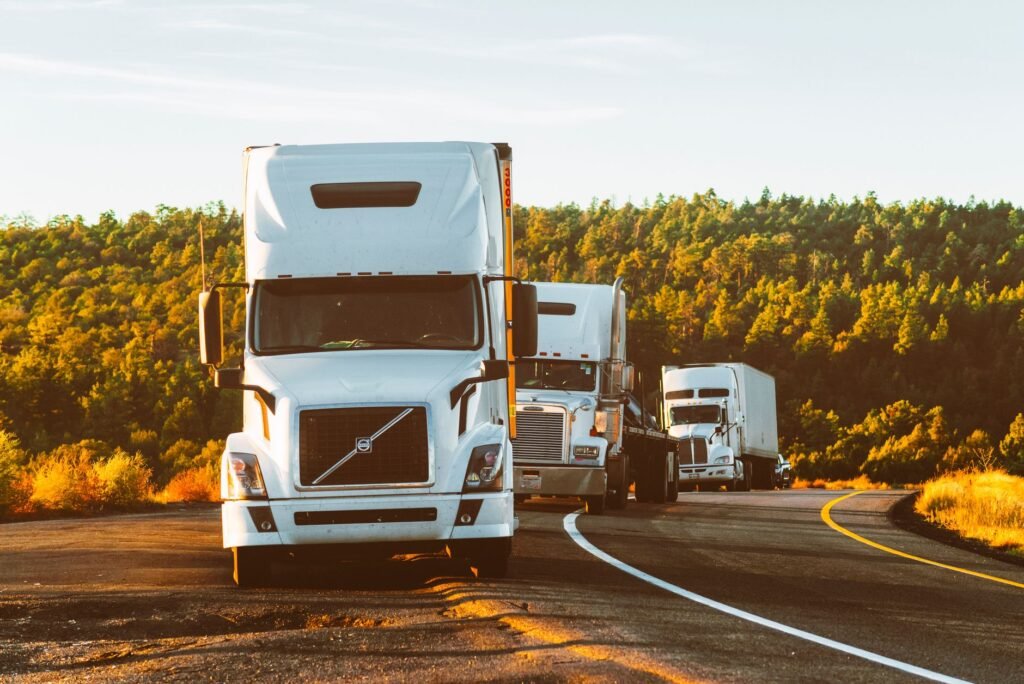 Thematic lead image: trucks, highway, logistics — Trucking Boom Exposes Deeper Infrastructure Strain in North America | National Times
