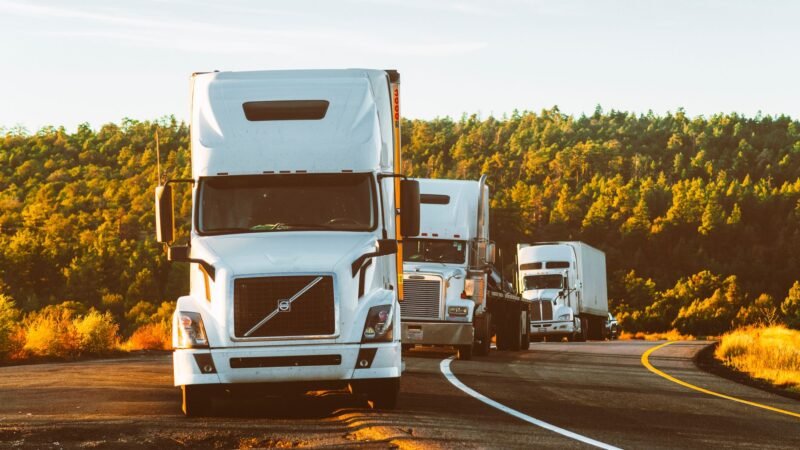 Thematic lead image: trucks, highway, logistics — Trucking Boom Exposes Deeper Infrastructure Strain in North America | National Times