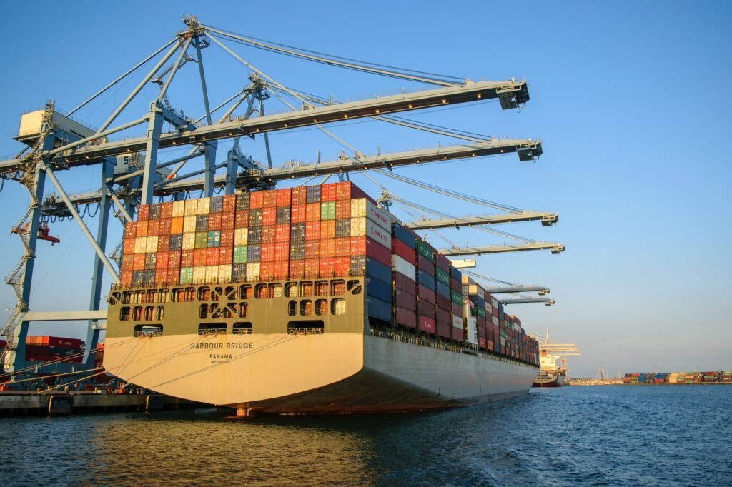 Thematic lead image: shipping containers, tariffs, global trade — Target's Tariff Windfall Challenges US Trade Policy Effectiveness | National Times