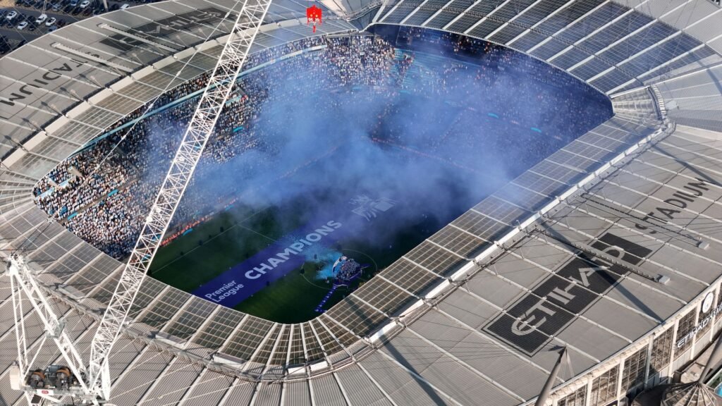 Thematic lead image: stadium, fireworks, crowd — Football Fan Injuries Highlight Broader Regulatory Failure | National Times