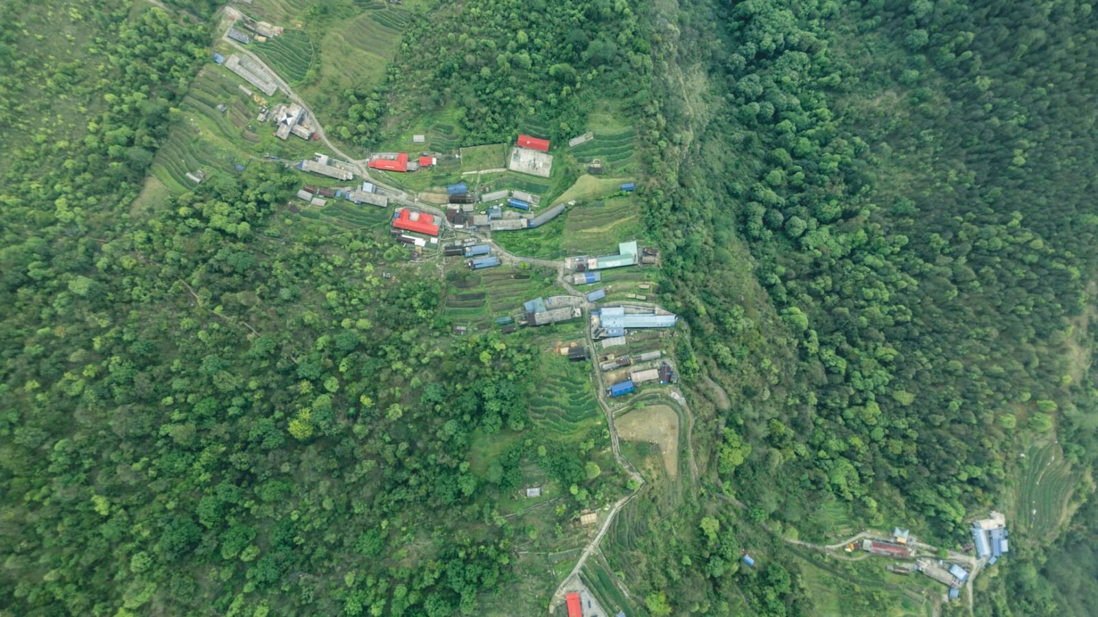 Thematic lead image: flood aftermath, mountain landscape — Nepal-Tibet floods: A test of regional disaster response and climate adaptation | National Times