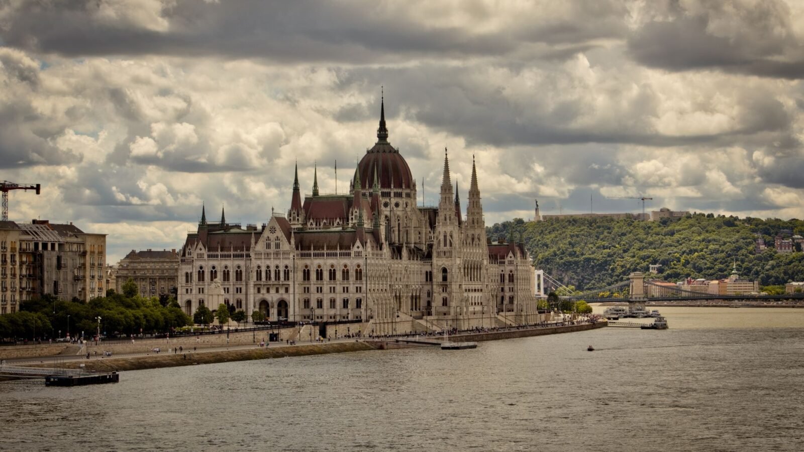 Thematic lead image: Hungarian Parliament Building, Forint currency — Hungary's Rate Cuts Challenge Orthodox Disinflation Playbook | National Times