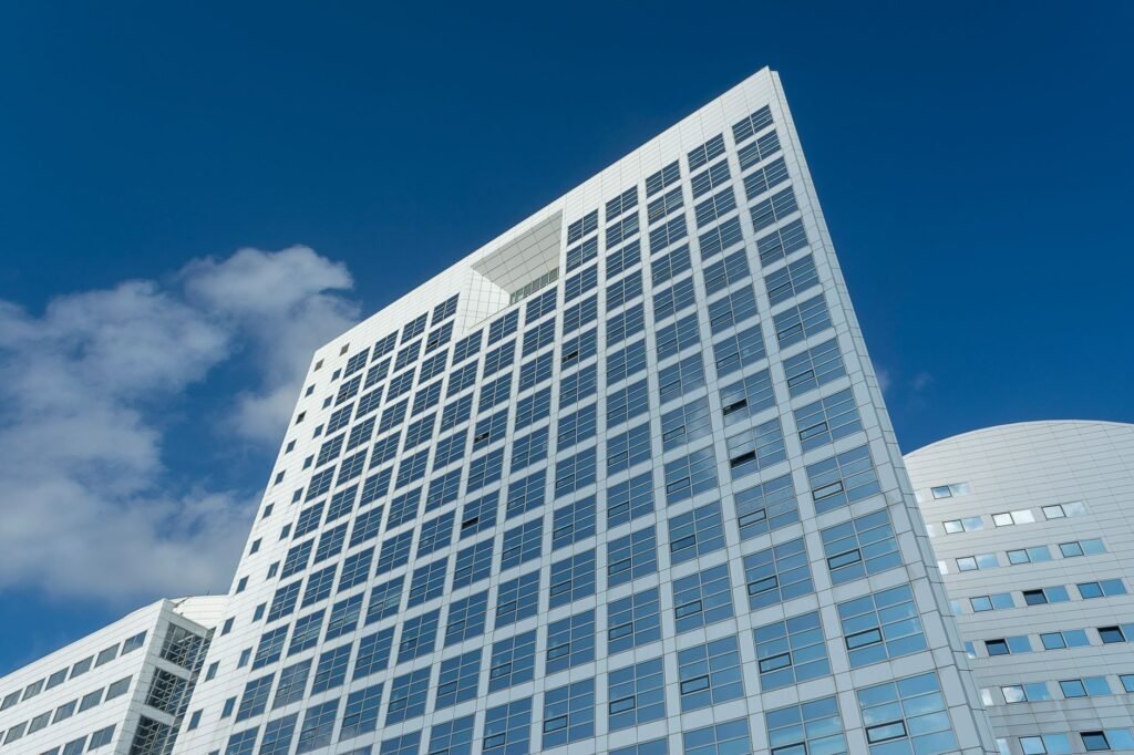 Thematic lead image: International Criminal Court building — The ICC's Legitimacy Crisis: Eroding Support From Within | National Times