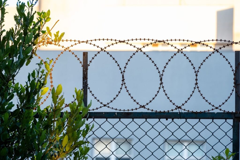 Thematic lead image: border fence migrants — Ceuta Crisis Foreshadows Broader EU Migration Policy Fractures by 2030 | National Times