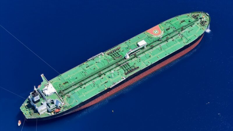 Thematic lead image: oil tanker in Strait of Hormuz — Hormuz: oil is trading a promise, not a passage | National Times