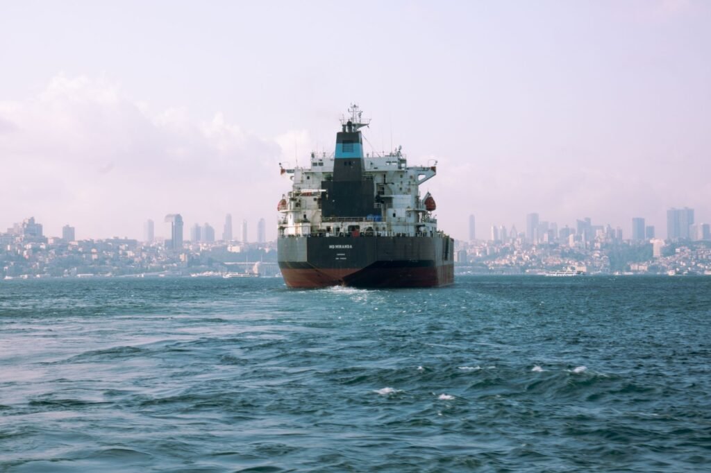 Thematic lead image: Strait of Hormuz shipping — Hormuz Shipping Corridor: A Tactical De-escalation, Not Strategic Thaw | National Times