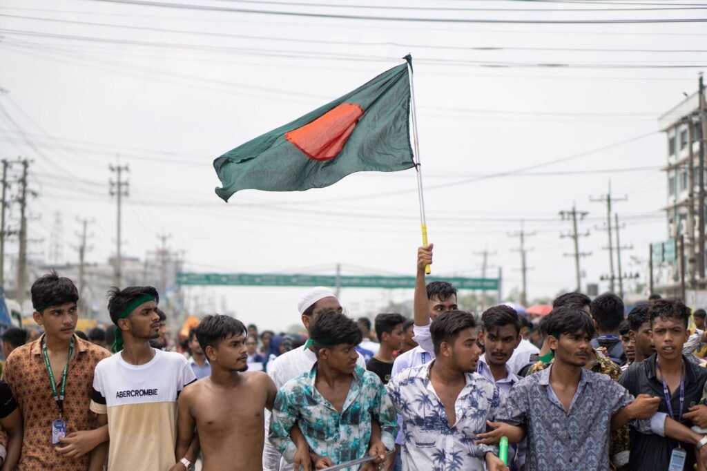Thematic lead image: protest, economic hardship — Bangladesh's youth unemployment tests Rahman's economic stability pledges | National Times