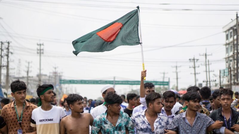 Thematic lead image: protest, economic hardship — Bangladesh's youth unemployment tests Rahman's economic stability pledges | National Times