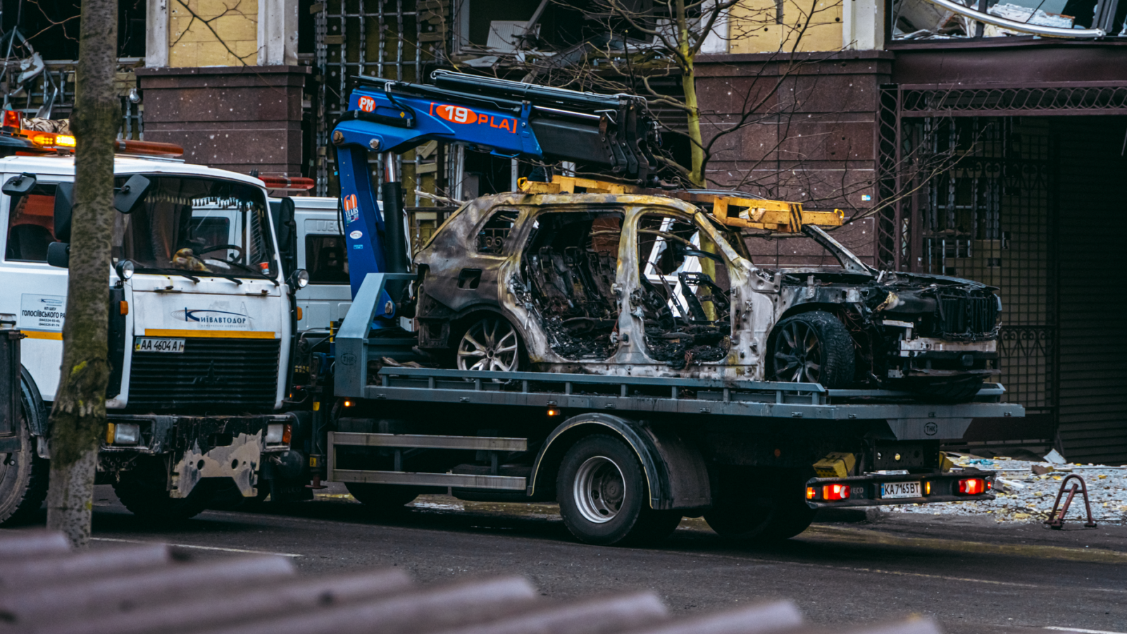 Thematic lead image: damaged warehouse, rescue operation — Kyiv Warehouse Strike: Unpacking Competing Narratives Amidst Civilian Casualties | National Times