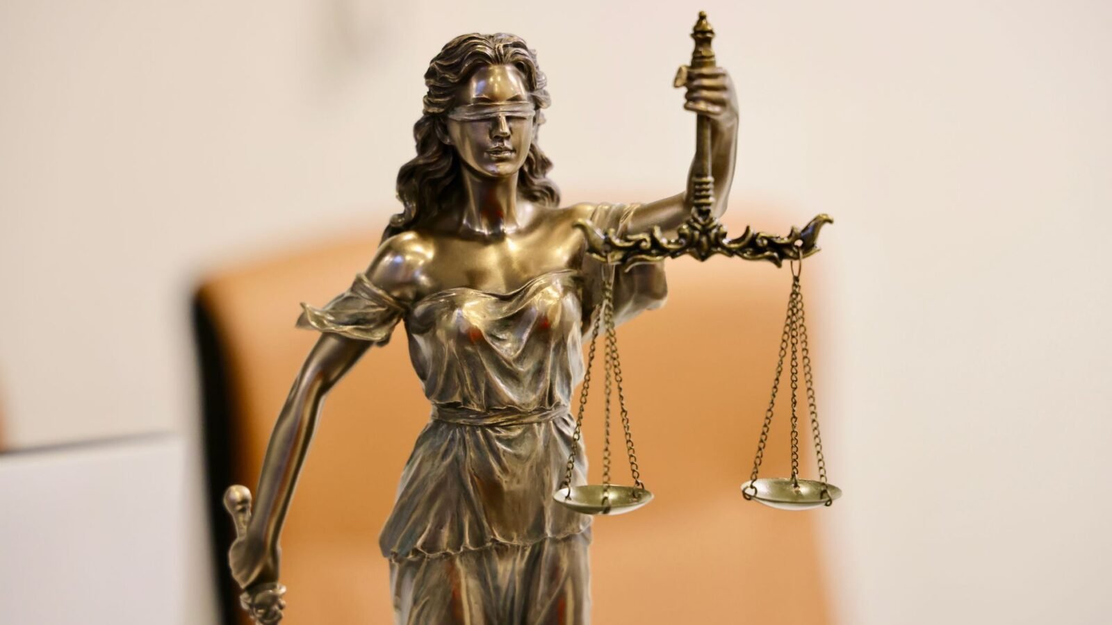Thematic lead image: legal scales, courthouse — Clancy Trial Verdict: A Bellwether for Legal Precedent on Mental State | National Times