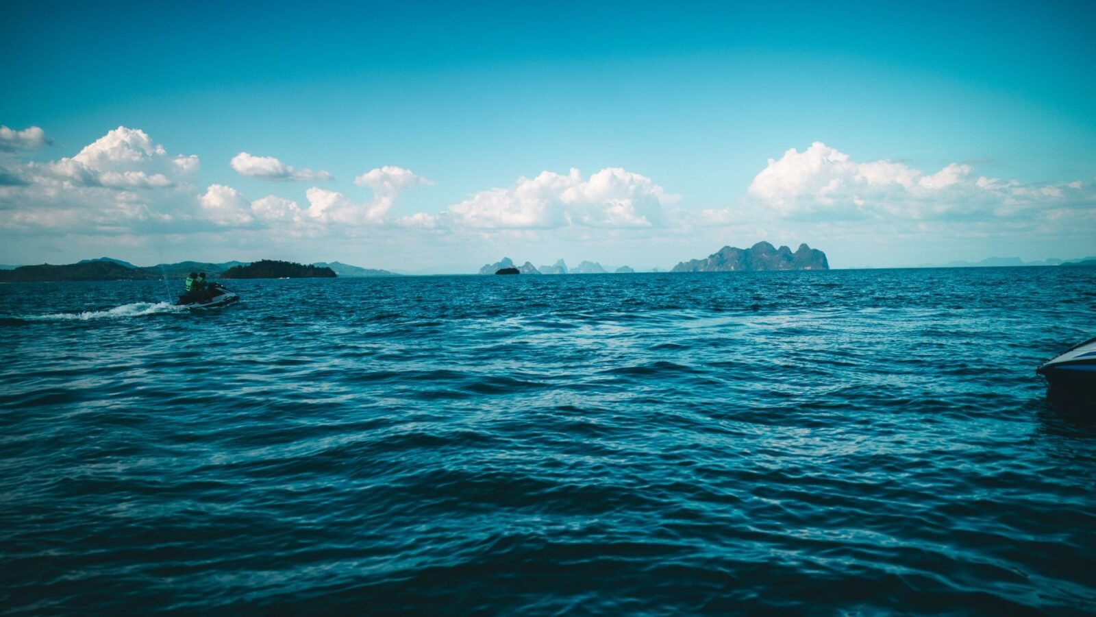 Thematic lead image: jet ski rescue, ocean — Thai Tourism's Reckoning: Safety Standards Under Scrutiny After Jet Ski Incident | National Times