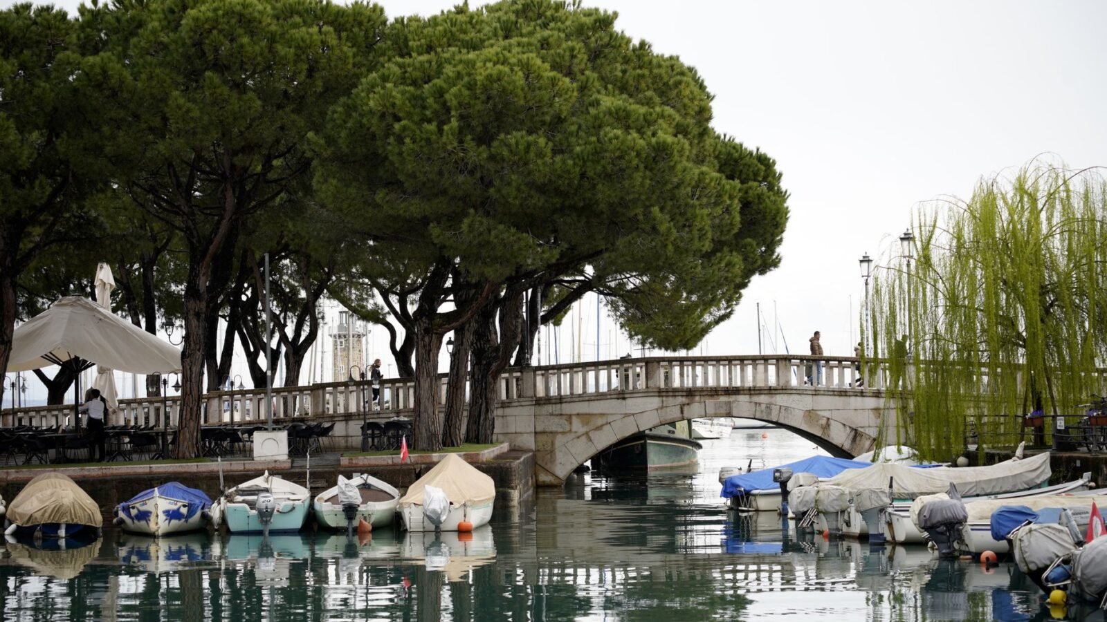 Thematic lead image: wildfire, climate change, tourism — Lake Garda Fire: A Harbinger of Mediterranean Climate Migration | National Times
