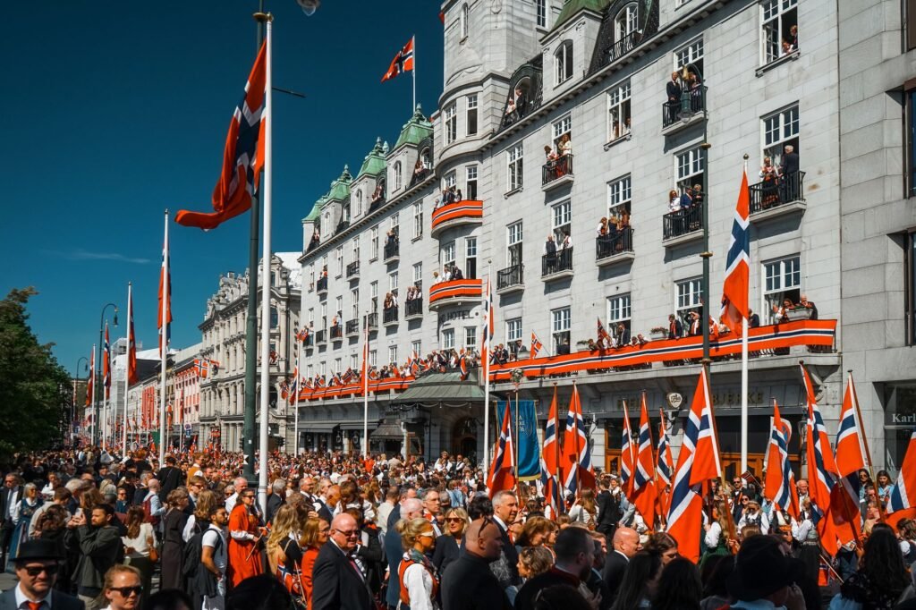 Thematic lead image: Royal palace, Norwegian flag — Norway's Monarchy at a Crossroads: Succession and Soft Power to 2030 | National Times