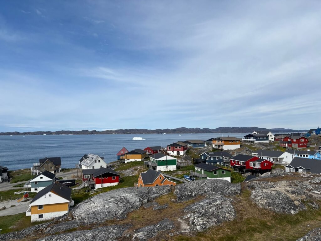 Thematic lead image: Inuit community and landscape — Greenland's Genocide Inquiry: The Limits of Historical Reckoning | National Times