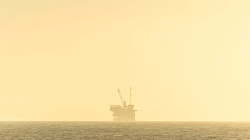 Thematic lead image: oil derricks at sunset — US-Venezuela Oil Deal: Economic Opportunity or Political Precedent? | National Times