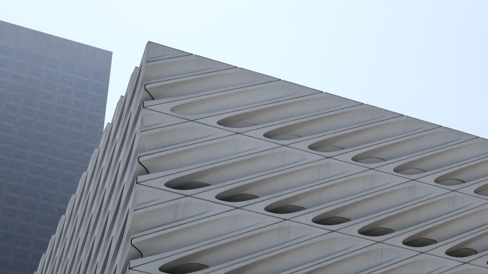 Thematic lead image: basketball stadium exterior — NBA Deal Highlights Escalating Valuation Discrepancy in Sports Assets | National Times