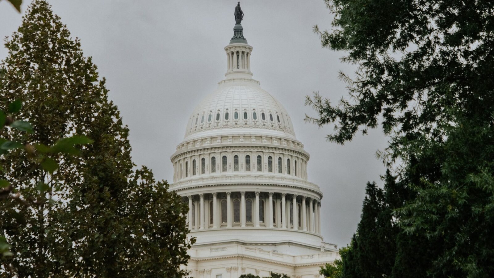 Thematic lead image: Federal Reserve building — Fed's Dissenting Voices Signal Shifting Policy Consensus | National Times
