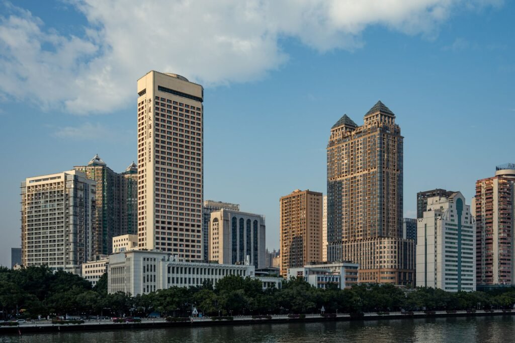 Thematic lead image: Evergrande headquarters, bankruptcy — Evergrande Founder's Life Sentence: Deterrence or Damage Control? | National Times