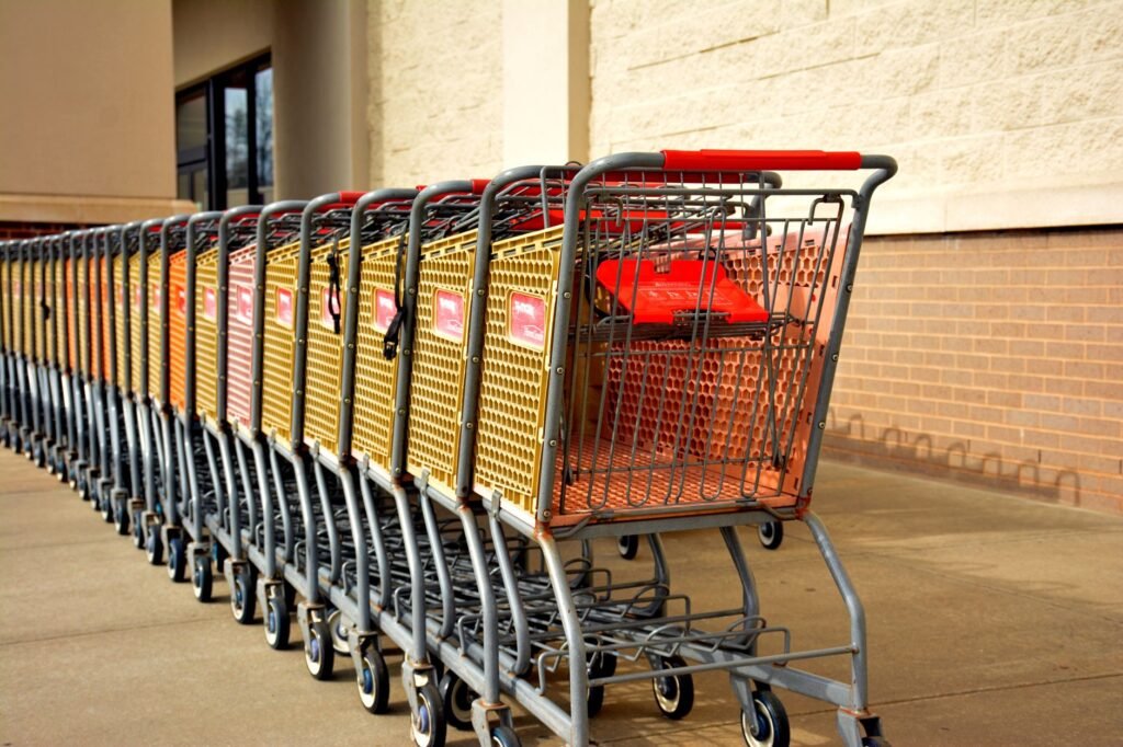 Thematic lead image: shopping carts, retail store — Walmart's Tariff Refund: A Deflationary Signal or Micro-Stimulus? | National Times