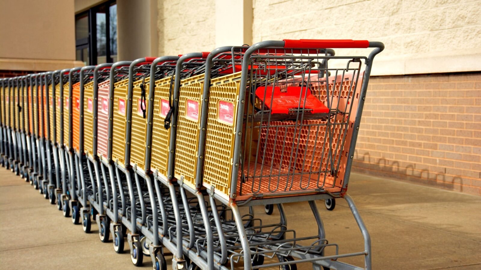 Thematic lead image: shopping carts, retail store — Walmart's Tariff Refund: A Deflationary Signal or Micro-Stimulus? | National Times