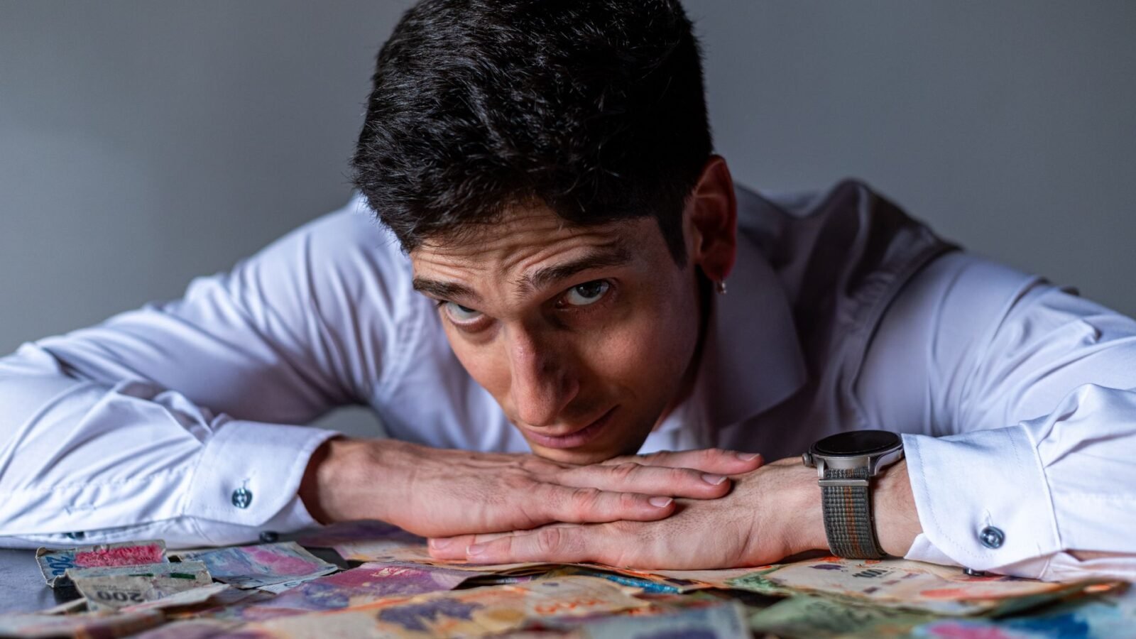 Thematic lead image: rial banknotes, economic crisis — Iran's Rial Devaluation: Three Paths to 2030 Amidst Geopolitical Pressure | National Times
