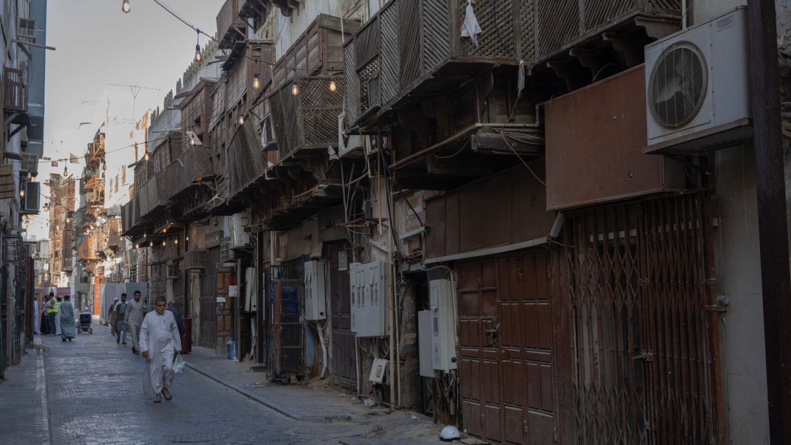 Thematic lead image: West Bank town street — Israeli Forces' Wedding Hall Raid Challenges West Bank De-escalation Efforts | National Times