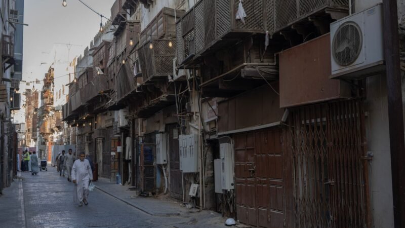 Thematic lead image: West Bank town street — Israeli Forces' Wedding Hall Raid Challenges West Bank De-escalation Efforts | National Times