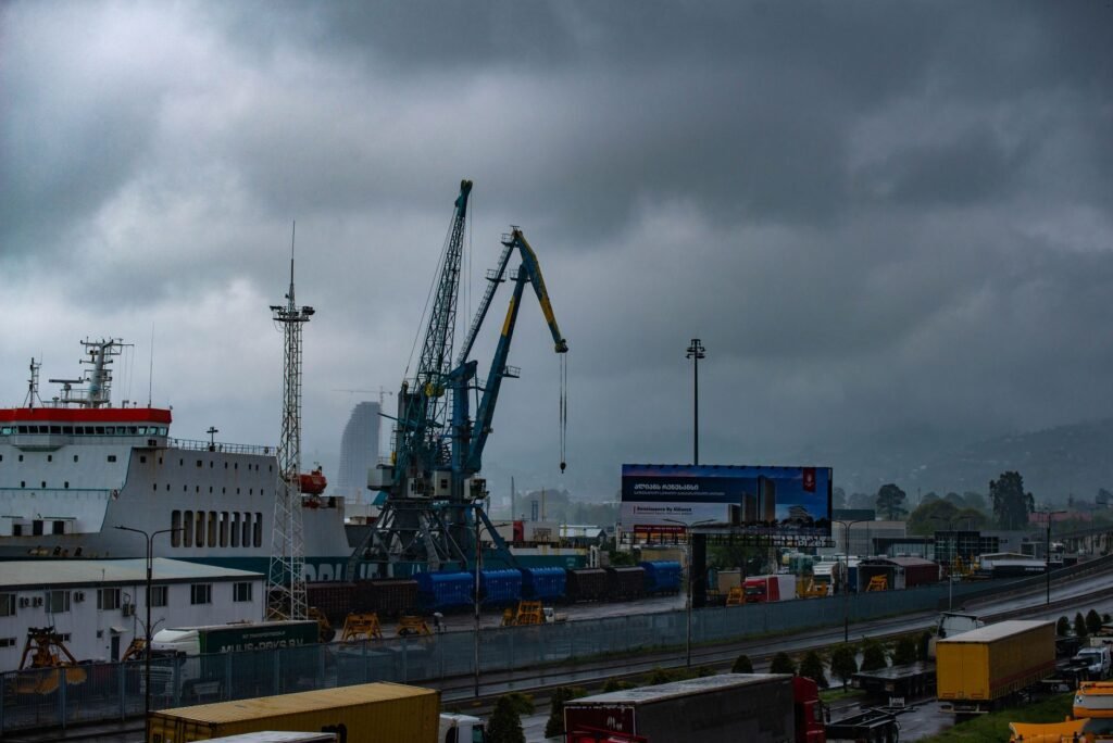 Thematic lead image: typhoon, port, shipping — Typhoon Dolphin: A Test of China's Supply Chain Resilience | National Times