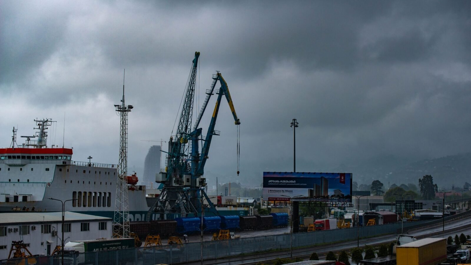 Thematic lead image: typhoon, port, shipping — Typhoon Dolphin: A Test of China's Supply Chain Resilience | National Times