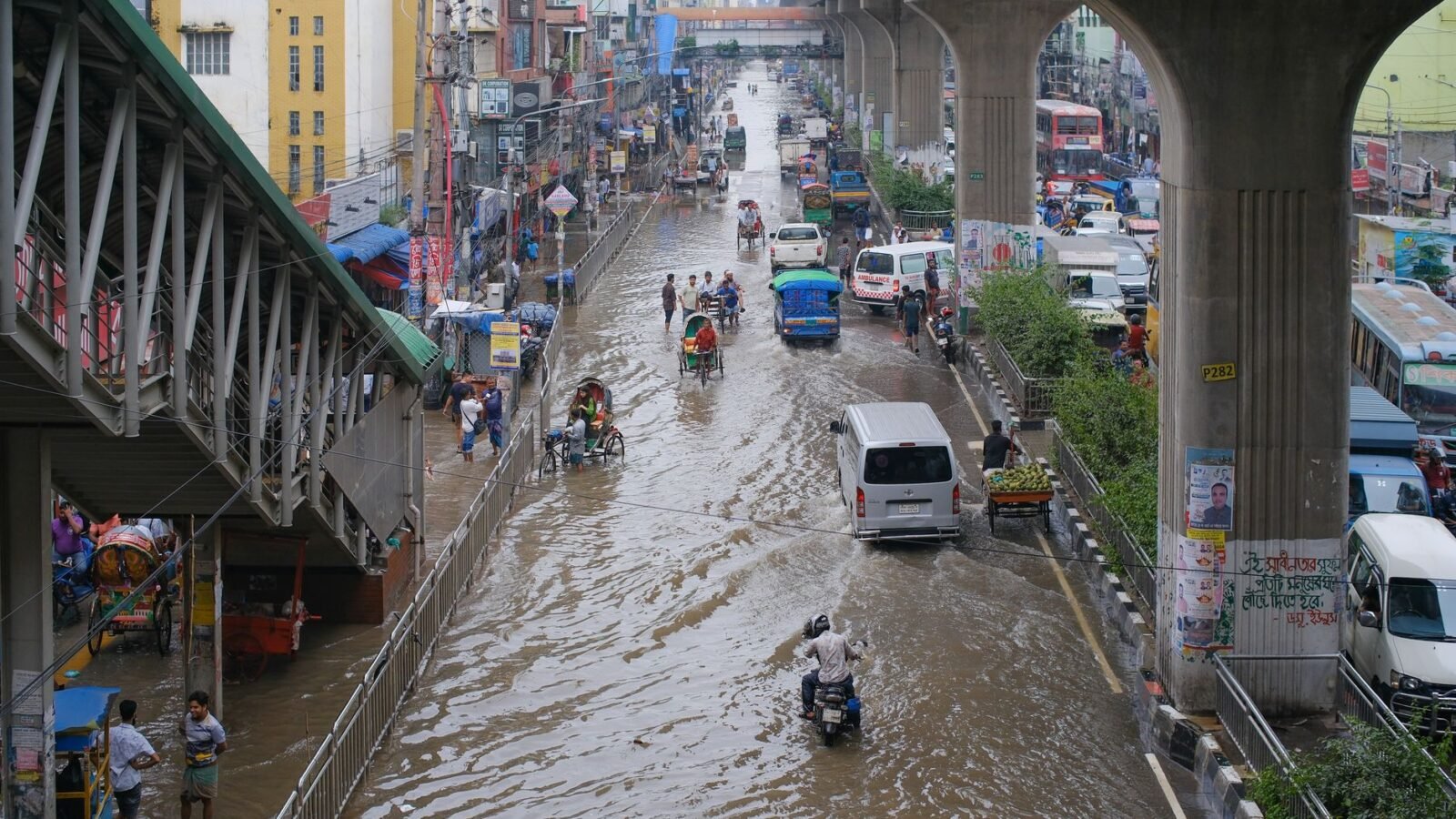 Thematic lead image: heavy rain, flooded streets — Japan's Infrastructure Stress-Tested by Extreme Weather Events | National Times