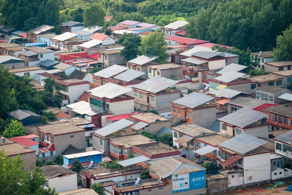 Thematic lead image: solar panels, electricity grid, power lines — China's Power Trading Ambitions Face Grid Integration Challenge | National Times