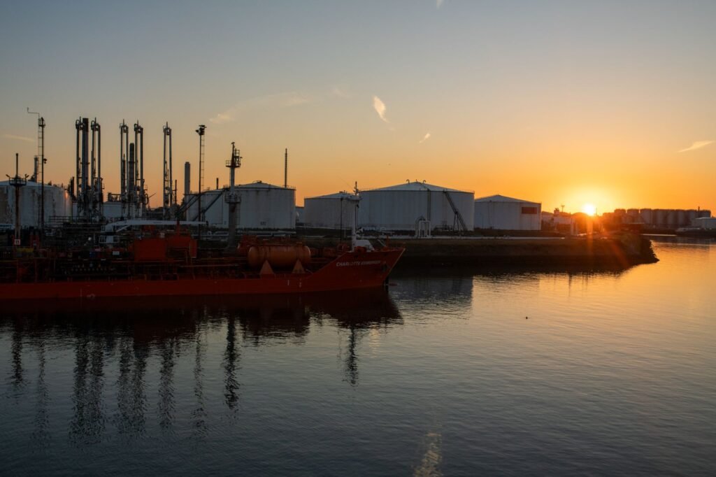 Thematic lead image: oil refining, finance, global trade — Economic Realignments Underpinning US-Israel-Iran Tensions | National Times