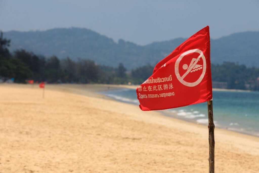 Thematic lead image: tourist destination, protest, flag — Phuket Flag Incident: A Microcosm of Geopolitical Risk for Tourism | National Times