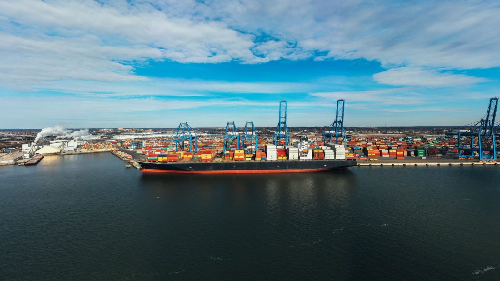 Thematic lead image: shipping containers global trade — Tariff Evasion: A New Front in US-China Economic Competition | National Times