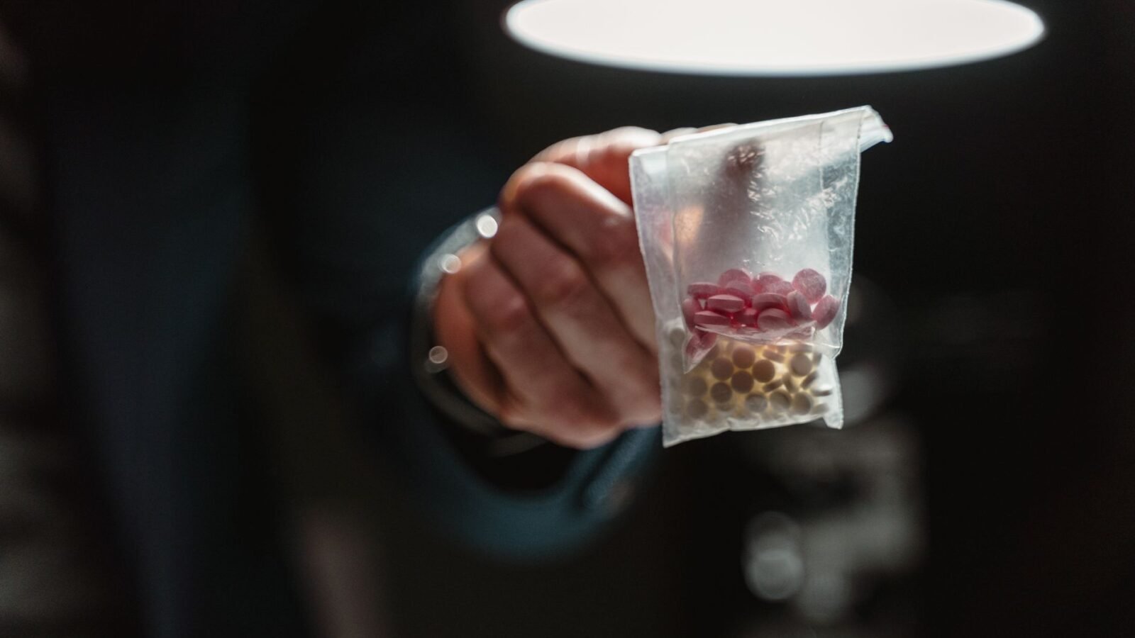 Thematic lead image: Illicit drug market, ecstasy pills — Trump-shaped ecstasy: A new vector for illicit drug market disruption | National Times