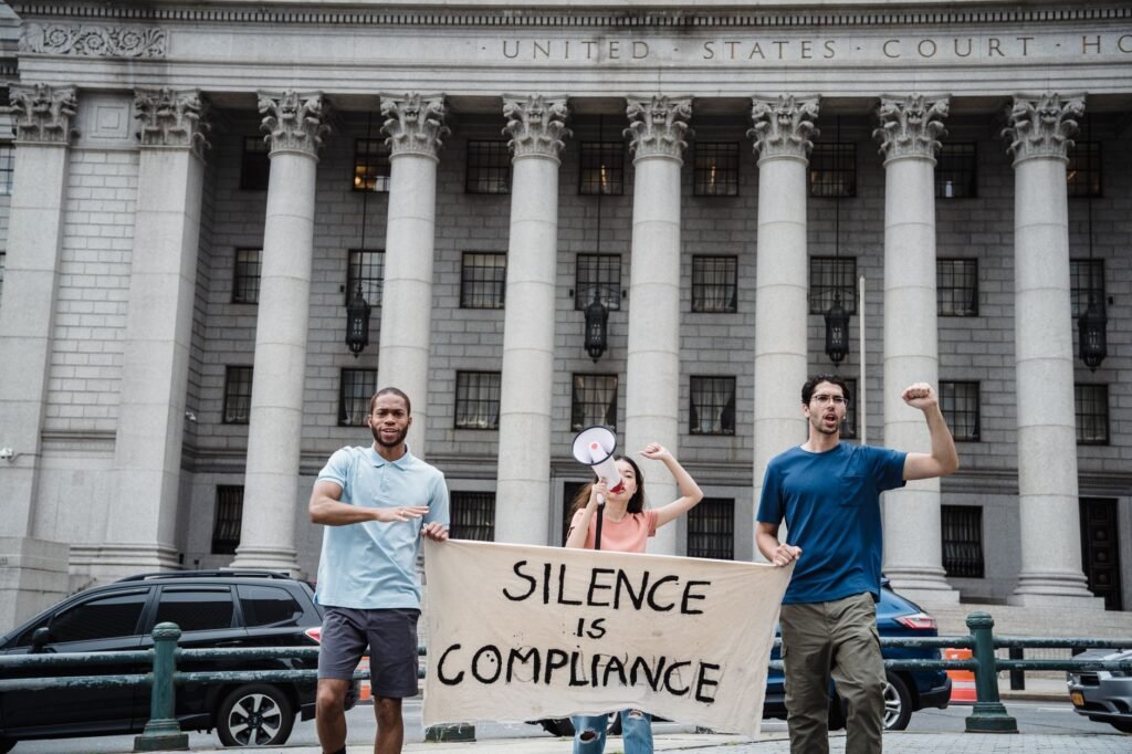 Thematic lead image: protest, courthouse, legal proceedings — Tate Bail Hearing: A Test of Influence Beyond Legal Precedent | National Times